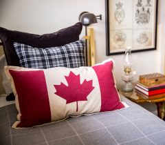 the small touch of a Canadian flag creates the decor of this boys room