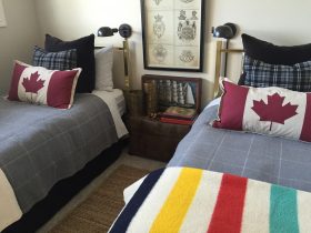 Twin brass beds with a few Canadian accents make a perfect guest room for when the grandsons come over.