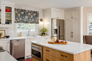 Every appliance and functional piece in this kitchen remodel is built-in beautifully.